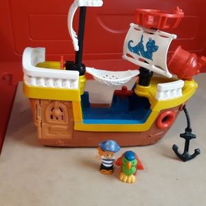 Fisher price little people pirate ship with accessories.